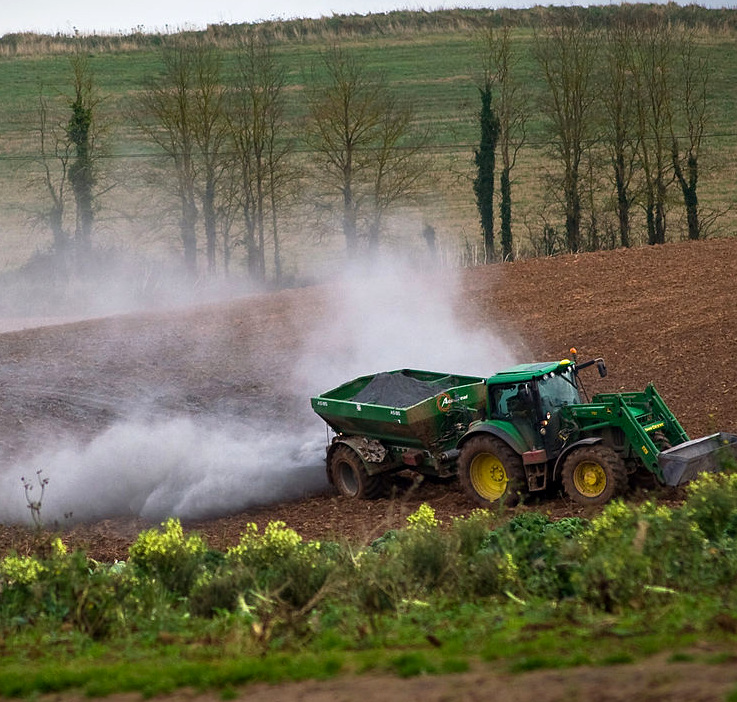 spreading lime; image courtesy of Mark Robinson