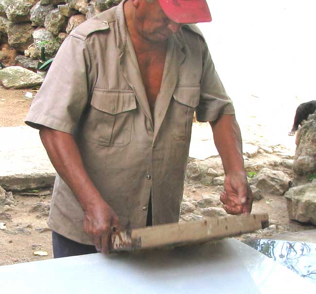 With a deft flip, the fibers are dumped onto the working surface.