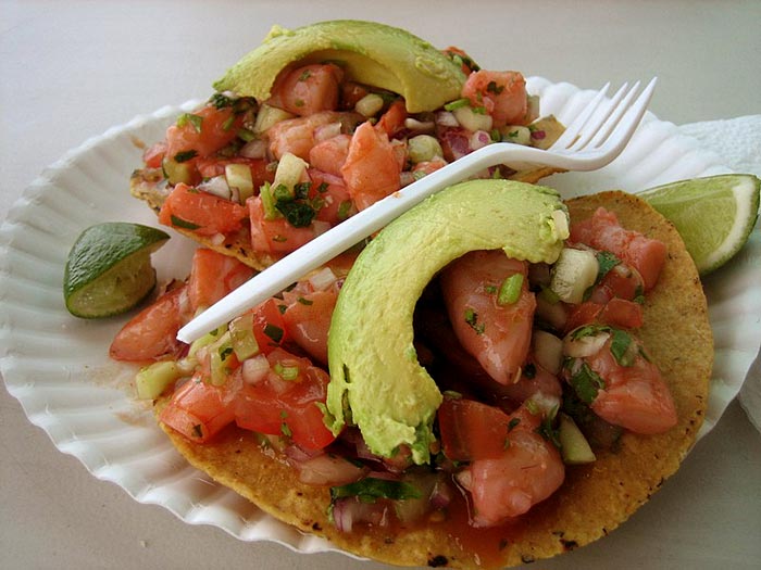 Shrimp tostadas (tostadas de ceviche de camarón) as served by Tacos Sinaloa (a taco truck) in Oakland, California; image courtesy of Ernesto Andrade