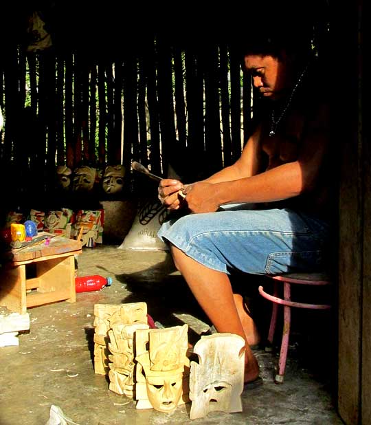 carving Maya masks in Yaxunah, Yucatán