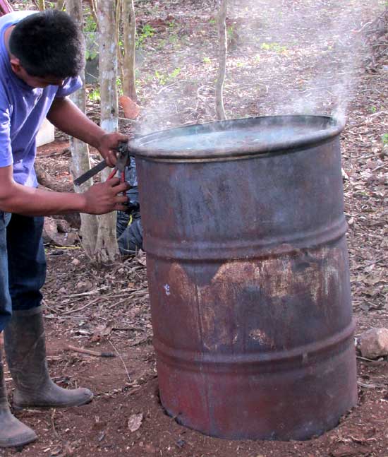 closing up stove for making charcoal