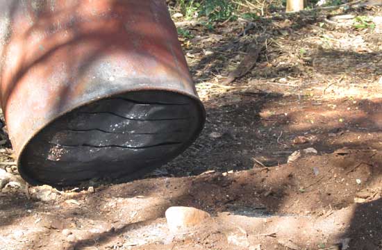 air slits in bottom stove for making charcoal