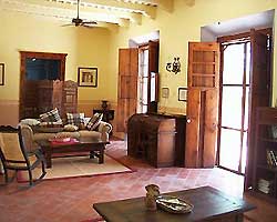 Sala & library inside Hacienda San Juan's main building