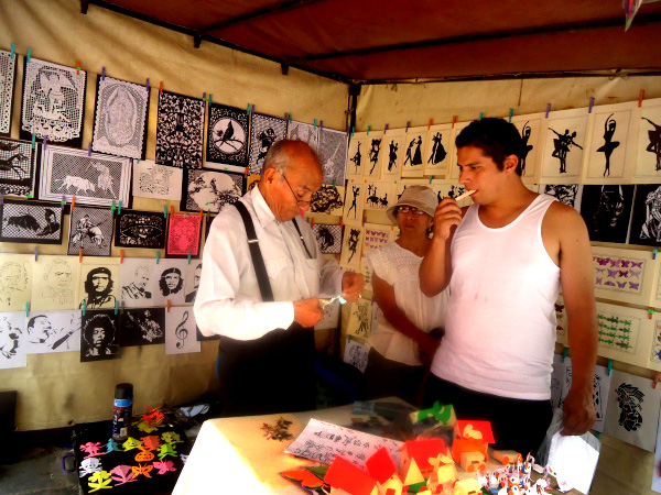 Teaching papel picado in Atlixco, Puebla México; image courtesy of Italia Ugalde via Wikimedia Commons